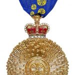 Ex CO awarded AO